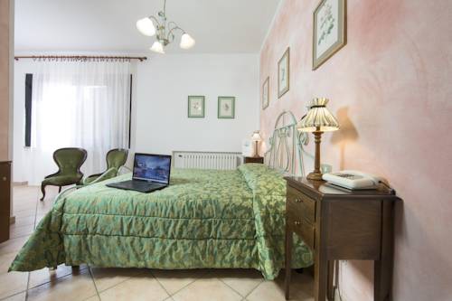 Imagen de la habitación del Hotel La Loggia - Villa Gloria. Foto 3