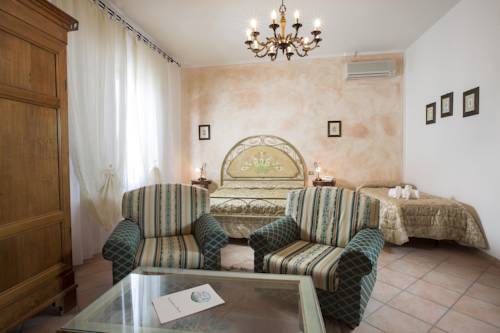 Imagen de la habitación del Hotel La Loggia - Villa Gloria. Foto 14