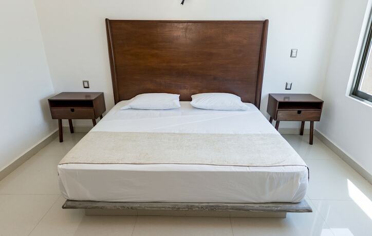 Imagen de la habitación del Hotel La Loma Suites. Foto 15