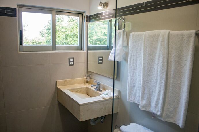 Imagen de la habitación del Hotel La Loma Suites. Foto 17