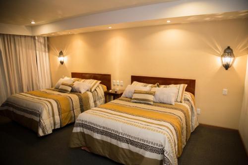 Imagen de la habitación del Hotel La Loma Tepic. Foto 7