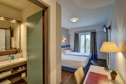Imagen de la habitación del Hotel La Longeraie. Foto 7