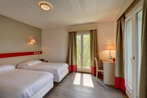 Imagen de la habitación del Hotel La Longeraie. Foto 10