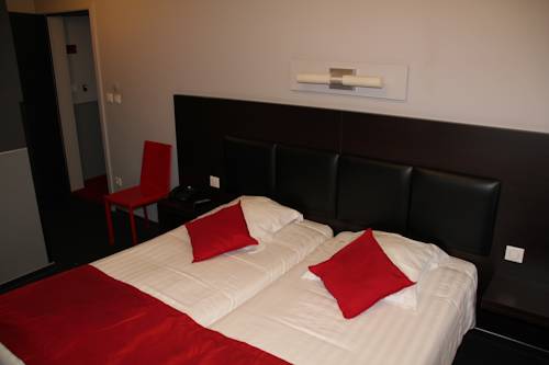 Imagen de la habitación del Hotel La Louve. Foto 6