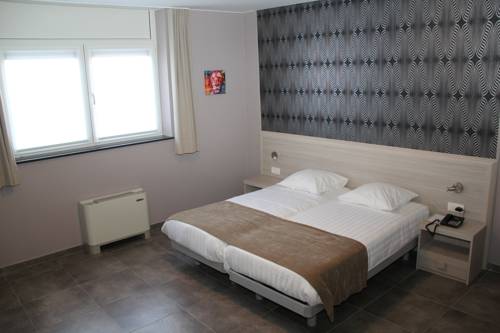 Imagen de la habitación del Hotel La Louve. Foto 9