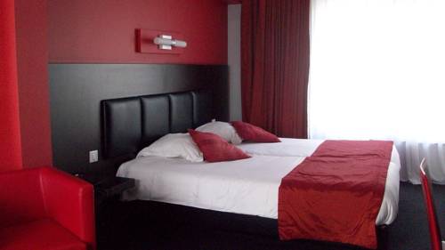 Imagen de la habitación del Hotel La Louve. Foto 16