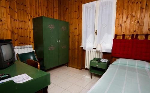 Imagen de la habitación del Hotel La Lucciola. Foto 5