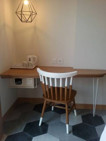 Imagen de la habitación del Hotel La Lucia Boutique By Prasanthi. Foto 22