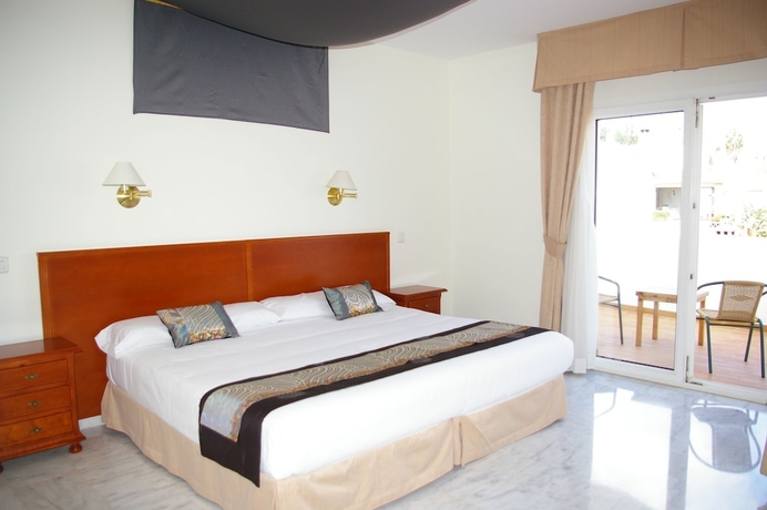 Imagen de la habitación del Hotel La Luna Blanca. Foto 7