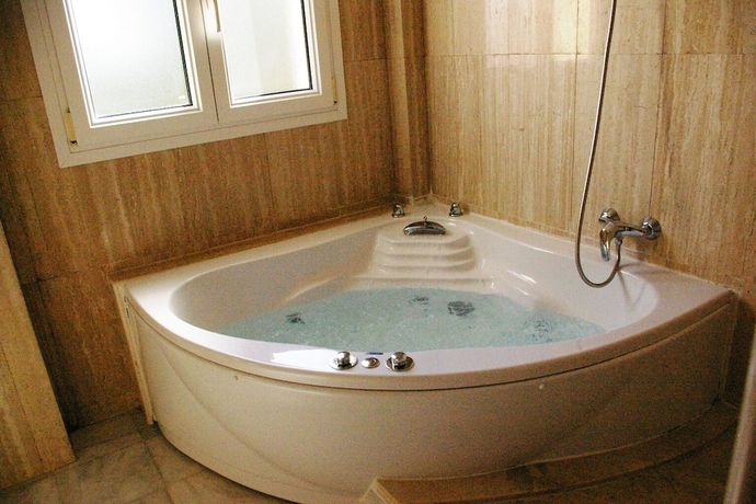 Imagen de la habitación del Hotel La Luna Blanca. Foto 11