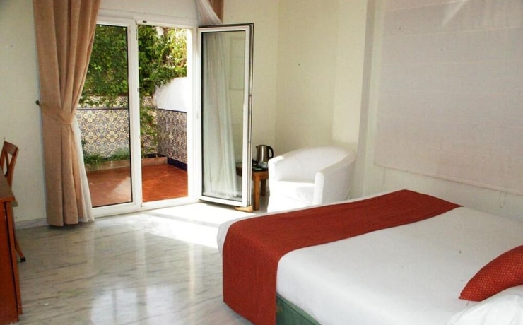 Imagen de la habitación del Hotel La Luna Blanca. Foto 13