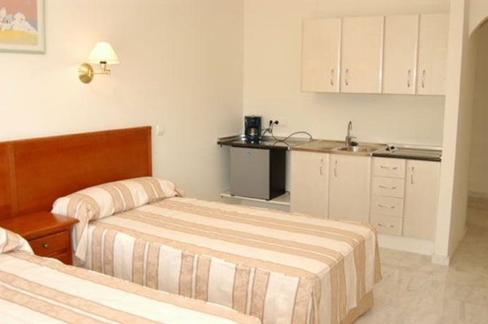 Imagen de la habitación del Hotel La Luna Blanca. Foto 17