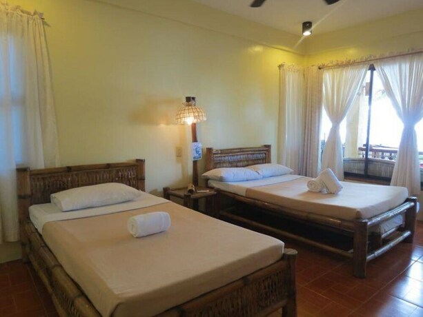 Imagen de la habitación del Hotel La Luz Beach Resort. Foto 35