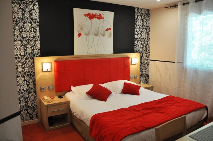 Imagen de la habitación del Hotel La Madone. Foto 2