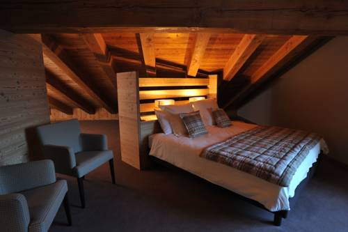 Imagen de la habitación del Hotel La Madonnina Del Gran Paradiso. Foto 5