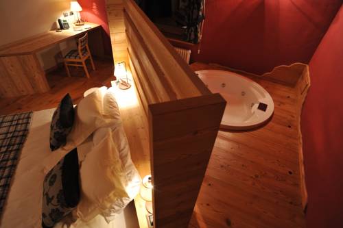 Imagen de la habitación del Hotel La Madonnina Del Gran Paradiso. Foto 7