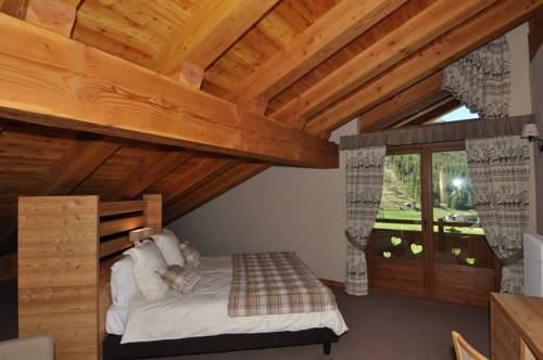 Imagen de la habitación del Hotel La Madonnina Del Gran Paradiso. Foto 13