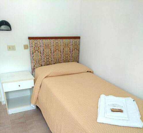 Imagen de la habitación del Hotel La Maggioressa. Foto 11