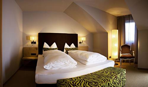 Imagen de la habitación del Hotel La Maiena Meran Resort. Foto 12