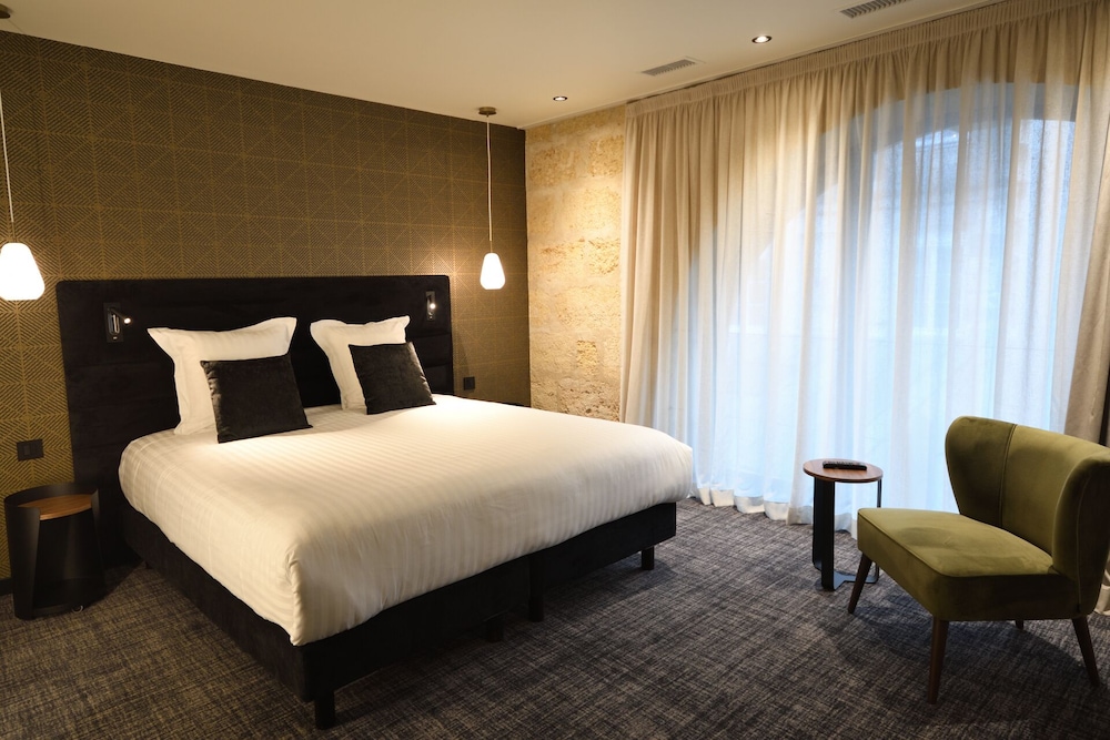 Imagen de la habitación del Hotel La Maison Bord'eaux. Foto 10