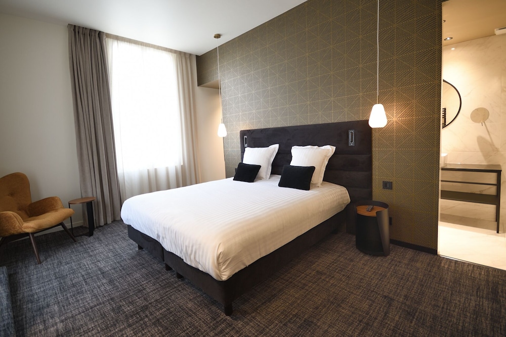 Imagen de la habitación del Hotel La Maison Bord'eaux. Foto 11