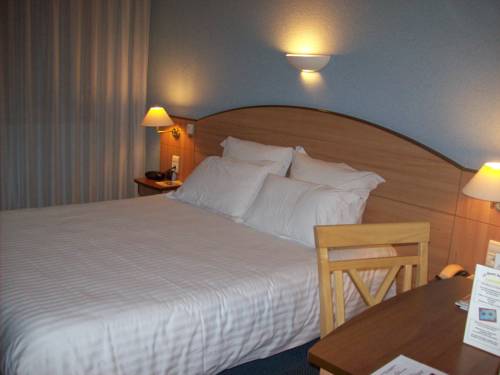 Imagen de la habitación del Hotel La Maison Carre. Foto 2