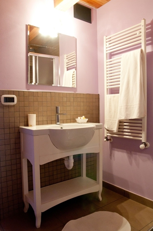 Imagen de la habitación del Hotel La Maison D'amelie. Foto 2