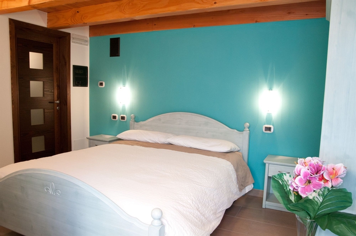 Imagen de la habitación del Hotel La Maison D'amelie. Foto 8