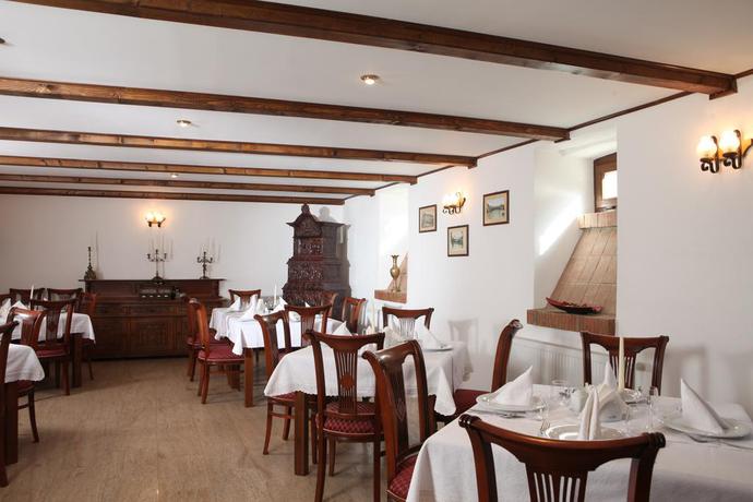 Imagen del bar/restaurante del Hotel La Maison De Caroline. Foto 2