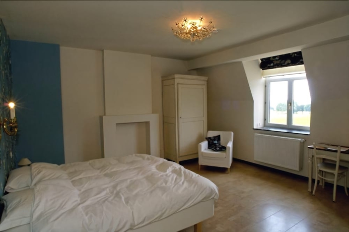Imagen de la habitación del Hotel La Maison De Ma&icirc;tre. Foto 6