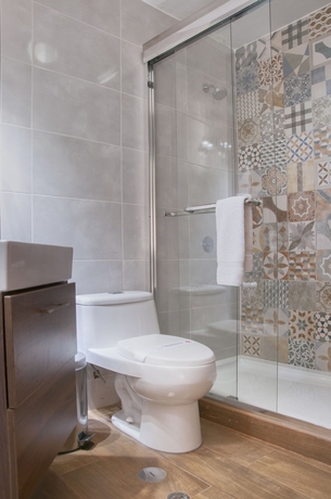 Imagen de la habitación del Hotel La Maison D'elise. Foto 17