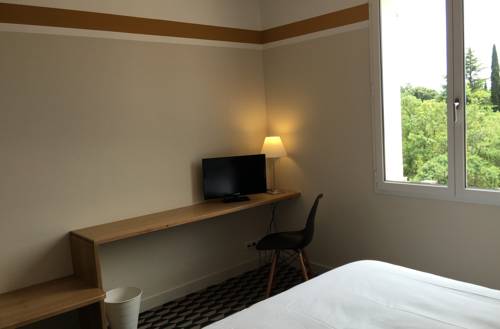 Imagen de la habitación del Hotel La Maison Des Ocres. Foto 3