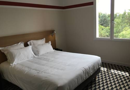 Imagen de la habitación del Hotel La Maison Des Ocres. Foto 5