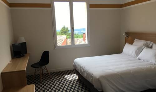 Imagen de la habitación del Hotel La Maison Des Ocres. Foto 6