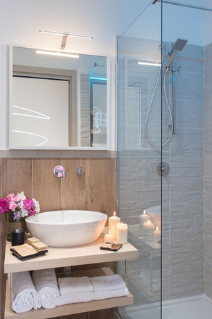 Imagen de la habitación del Hotel La Maison Des Tout Le Monde. Foto 13