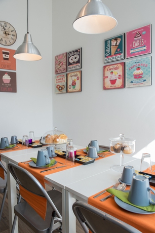 Imagen del bar/restaurante del Hotel La Maison Des Tout Le Monde. Foto 6