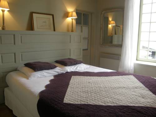 Imagen de la habitación del Hotel La Maison Douce. Foto 3