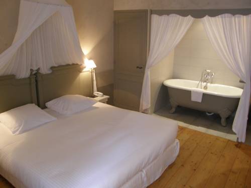 Imagen de la habitación del Hotel La Maison Douce. Foto 5
