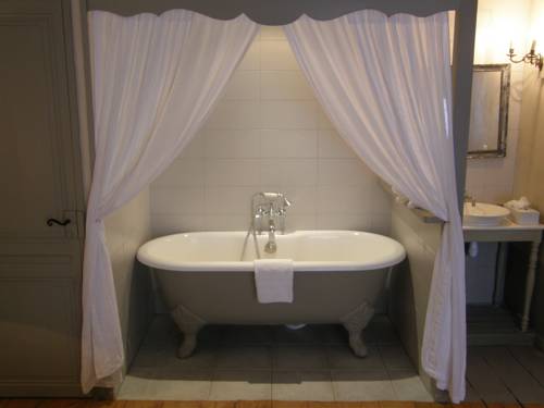 Imagen de la habitación del Hotel La Maison Douce. Foto 6