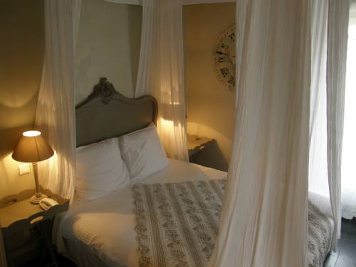Imagen de la habitación del Hotel La Maison Douce. Foto 8