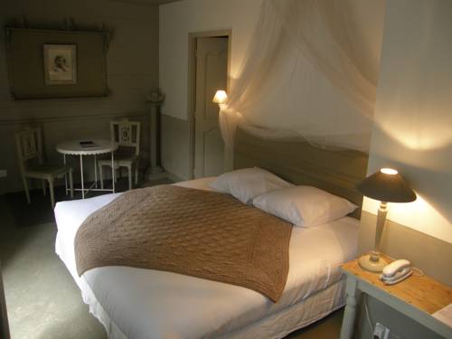Imagen de la habitación del Hotel La Maison Douce. Foto 9