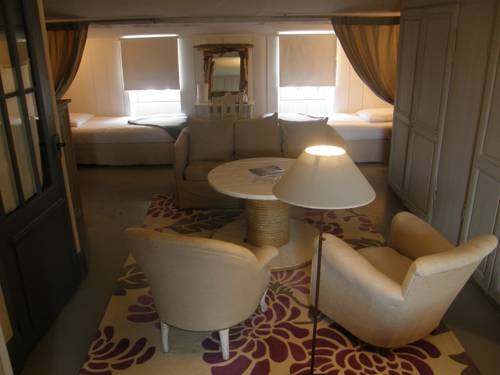 Imagen de la habitación del Hotel La Maison Douce. Foto 10