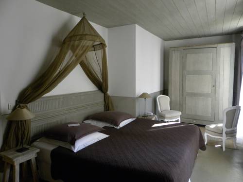 Imagen de la habitación del Hotel La Maison Douce. Foto 12
