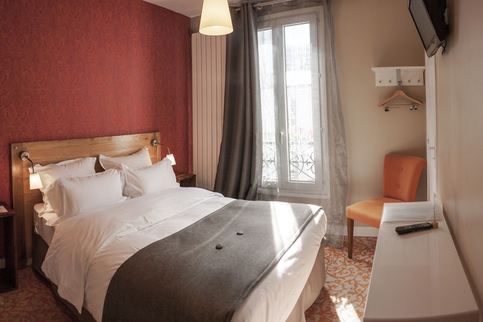 Imagen de la habitación del Hotel La Maison Montparnasse. Foto 7