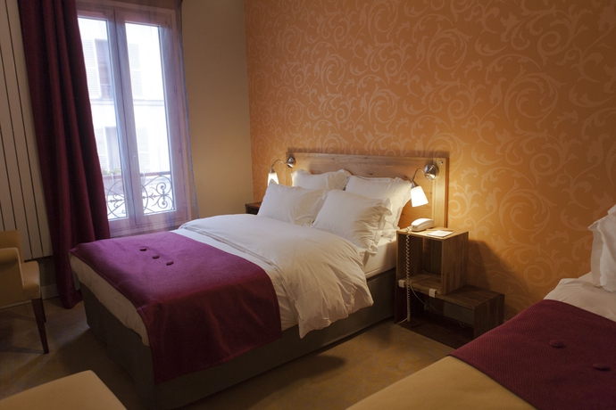 Imagen de la habitación del Hotel La Maison Montparnasse. Foto 8