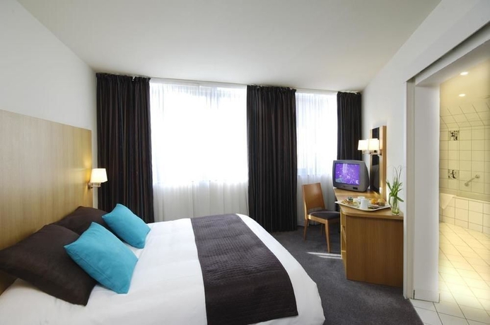 Imagen de la habitación del Hotel La Maison Mulhouse Centre. Foto 5