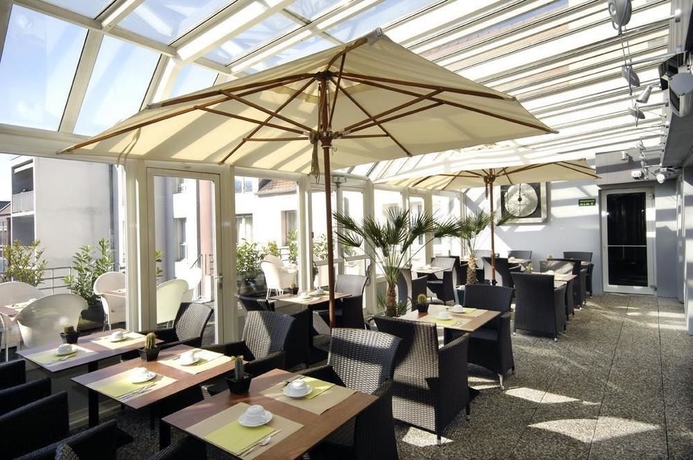 Imagen del bar/restaurante del Hotel La Maison Mulhouse Centre. Foto 2