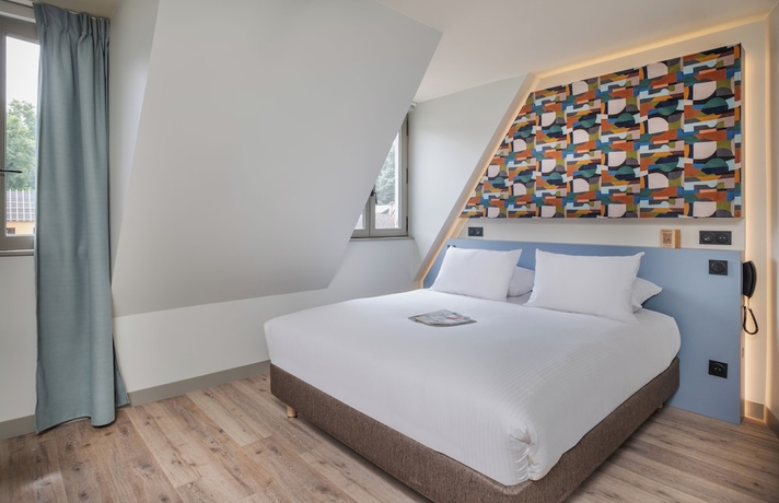 Imagen de la habitación del Hotel La Maison Rabelais. Foto 7