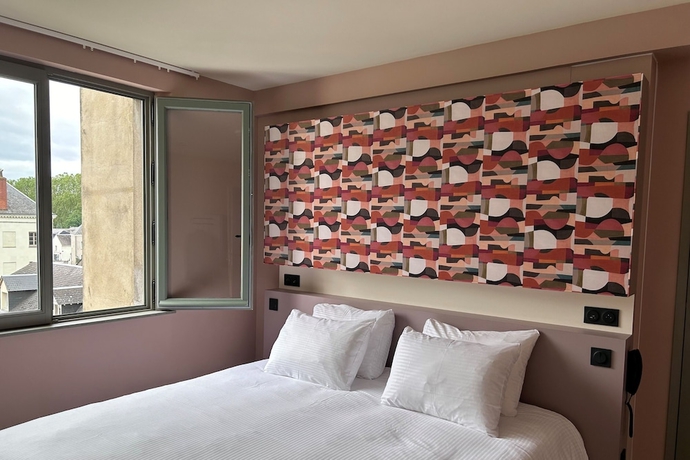 Imagen de la habitación del Hotel La Maison Rabelais. Foto 9