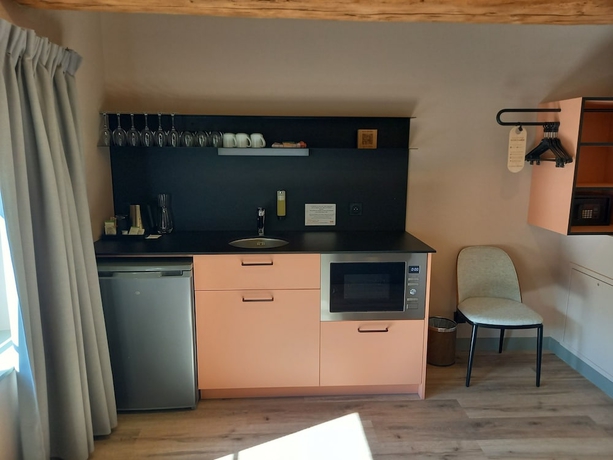 Imagen de la habitación del Hotel La Maison Rabelais. Foto 12